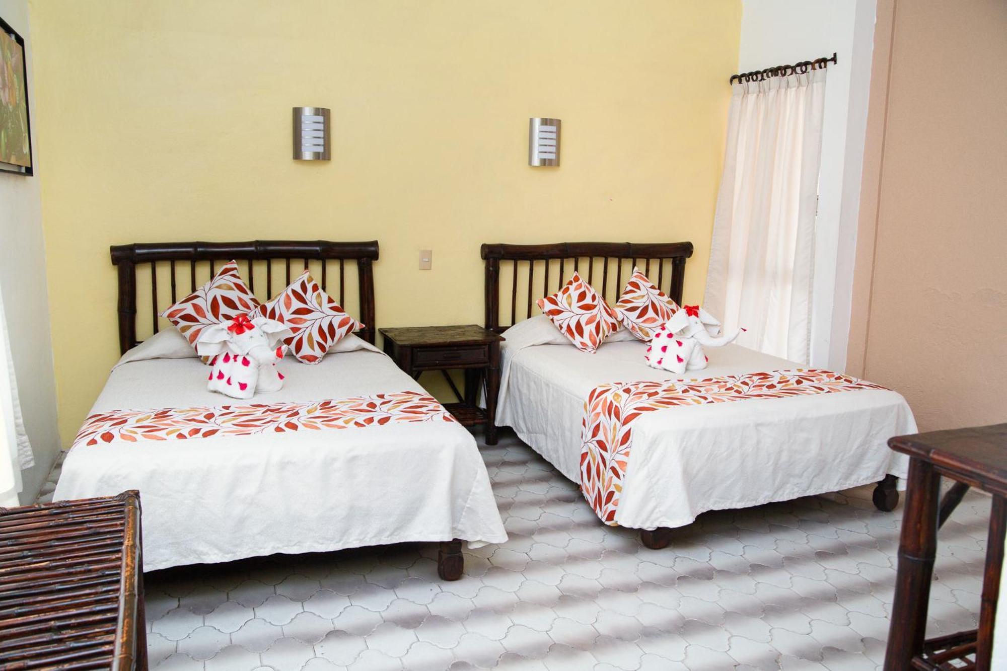 Hotel Zihua Caracol ซีฮัวตาเนโค ภายนอก รูปภาพ